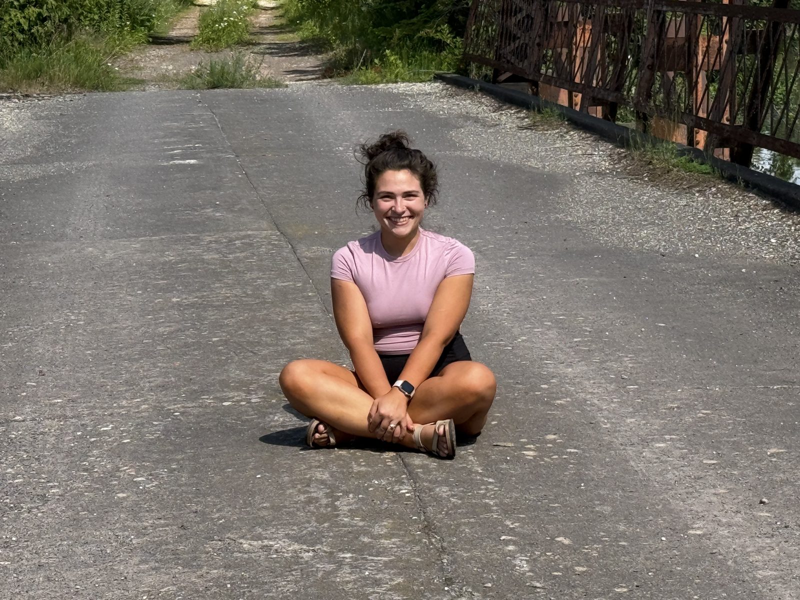 Lexy smiling outdoors